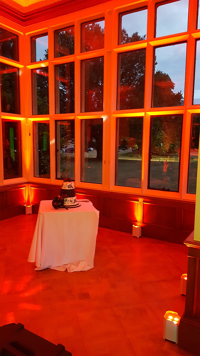Red Venue Alive Mood Lights in the Drawing Room Window in Shuttleworth House